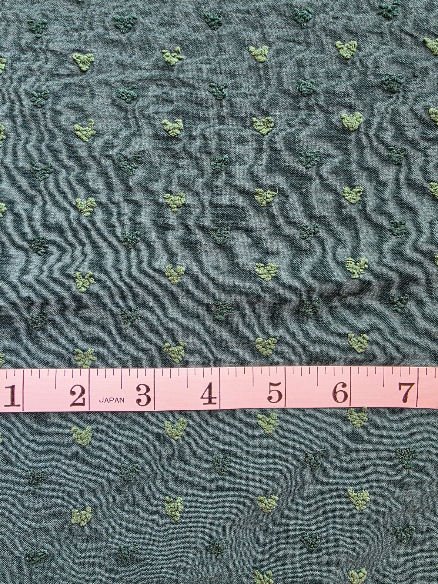 Green Poly Swiss Heart | Sold By The Half Yard